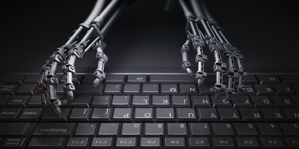 Robot hands on keyboard