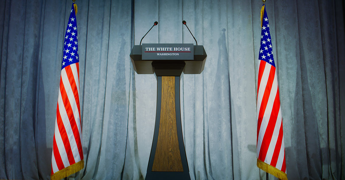 image of empty podium with usa flags
