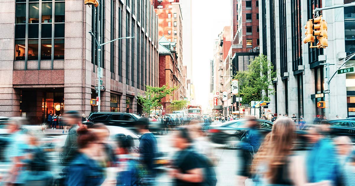 people rushing in the busy city