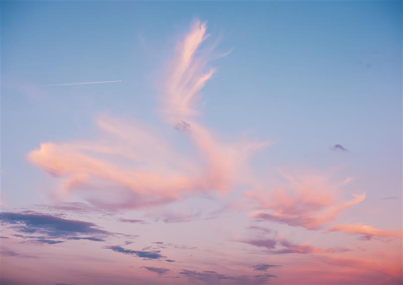 wispy clouds at sunset engagement policy