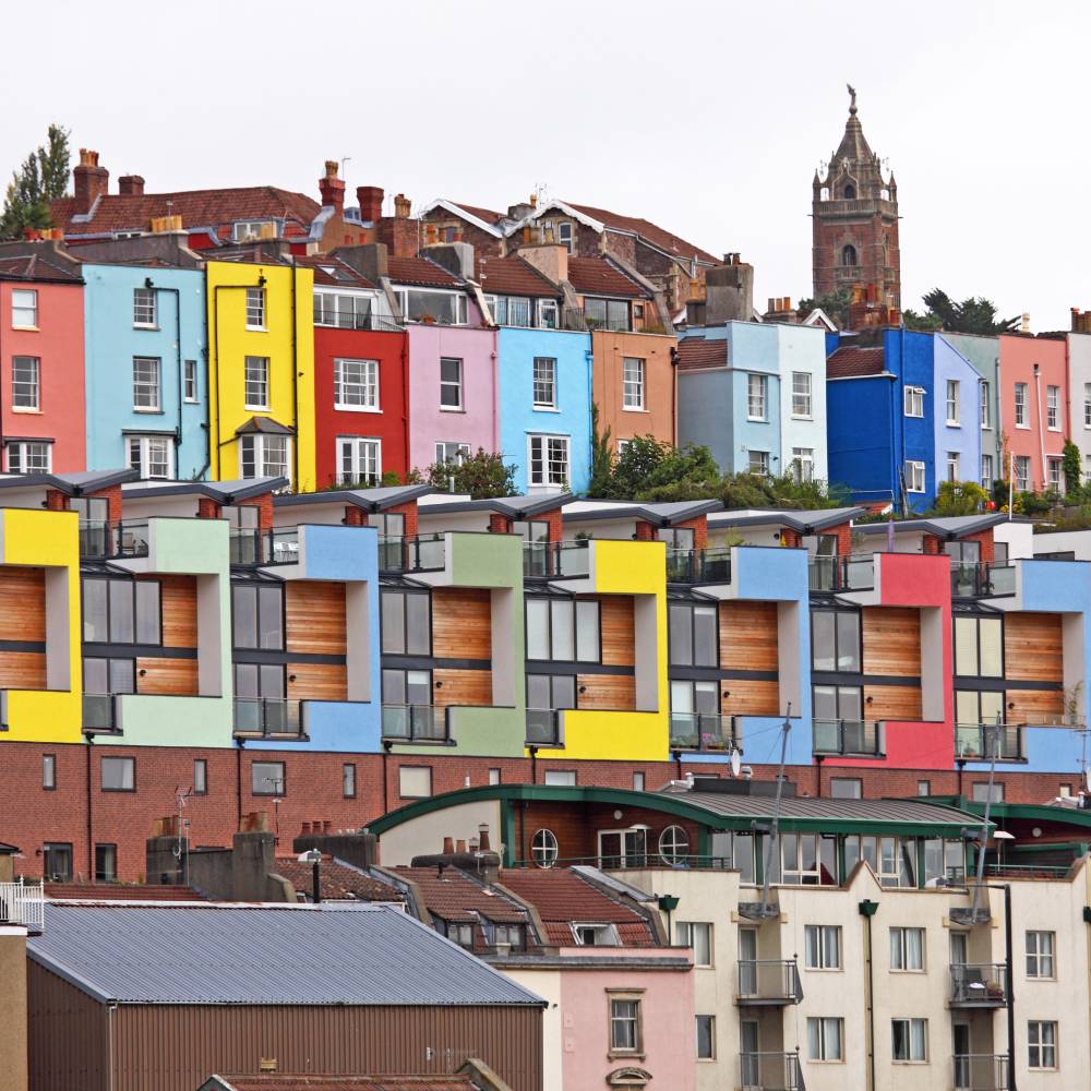 Rows of colourful apartments in a city