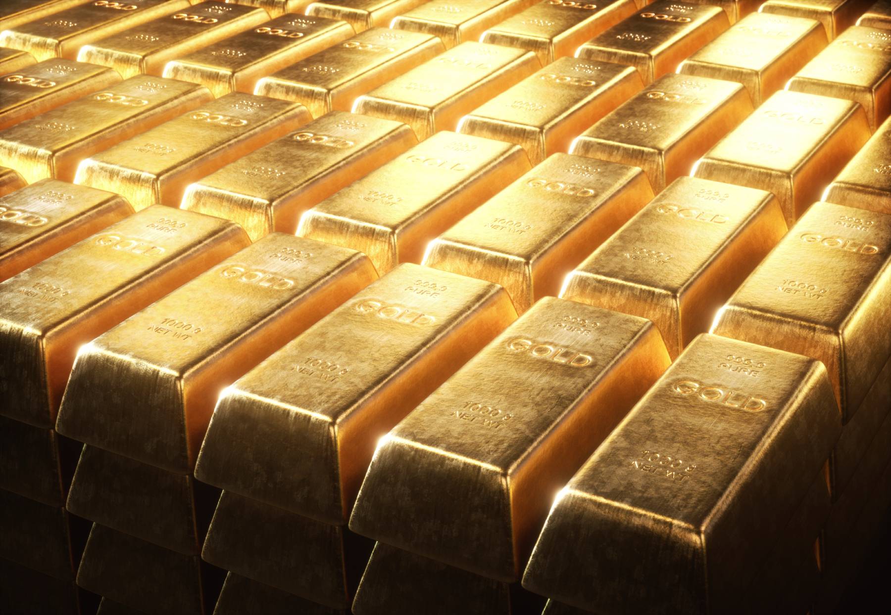 Gold bars stacked up together