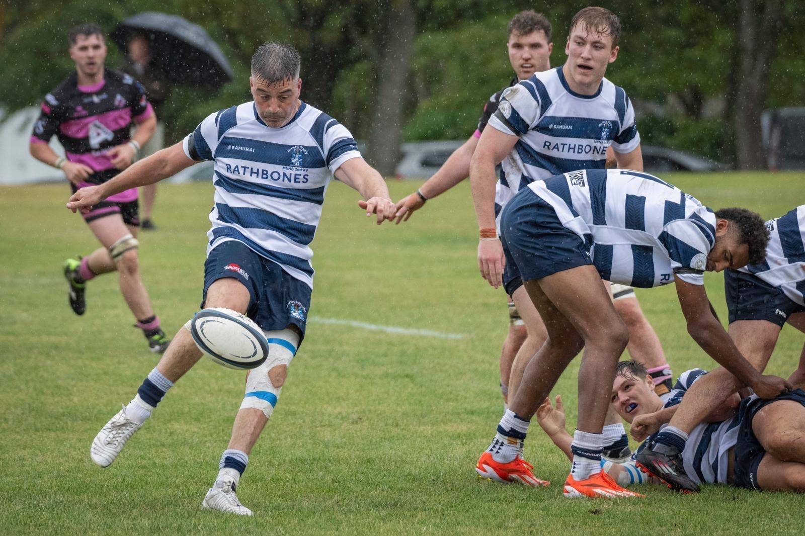 A Heriots Rugby Club player kicks out of a ruck