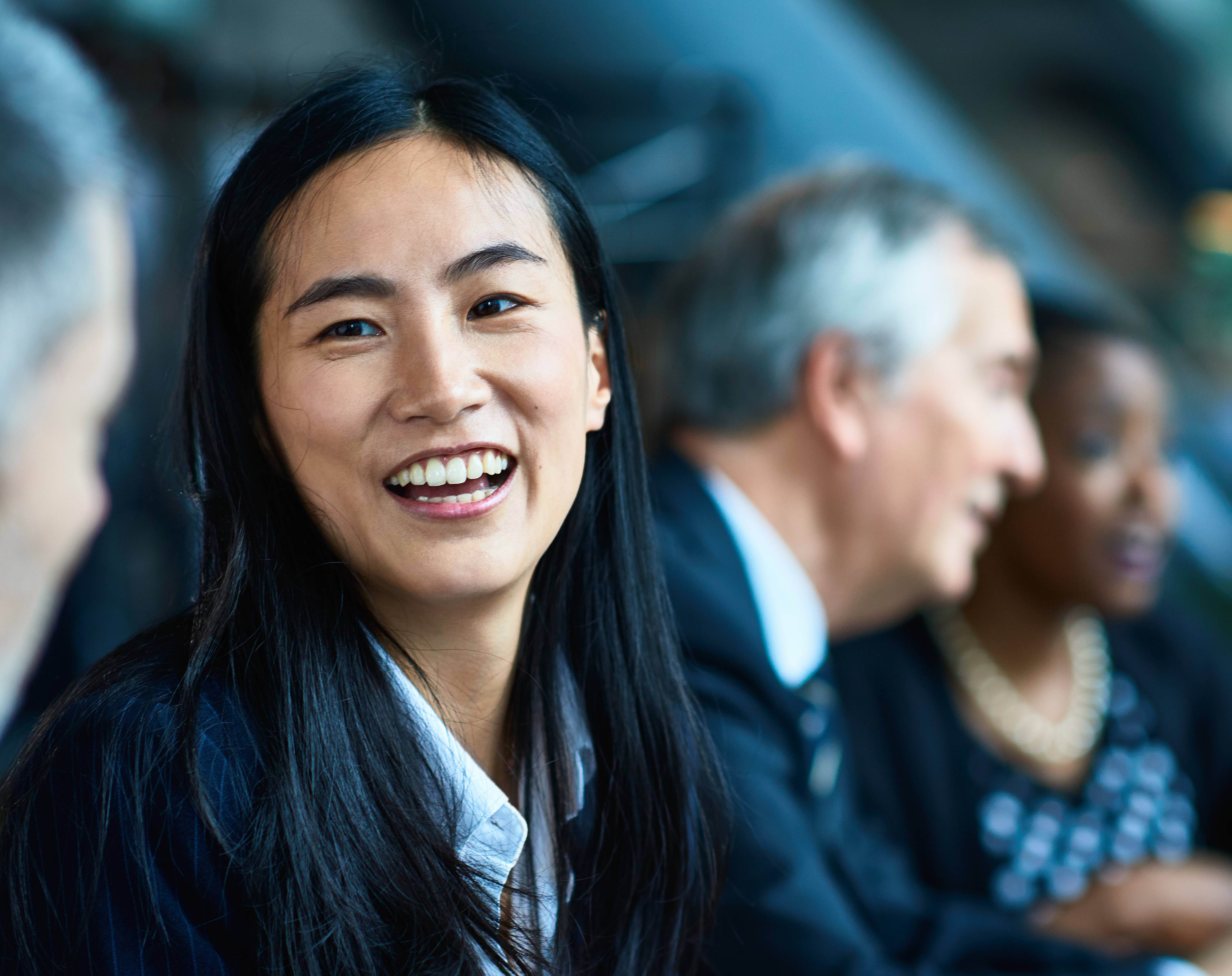 Young woman smiling at an event