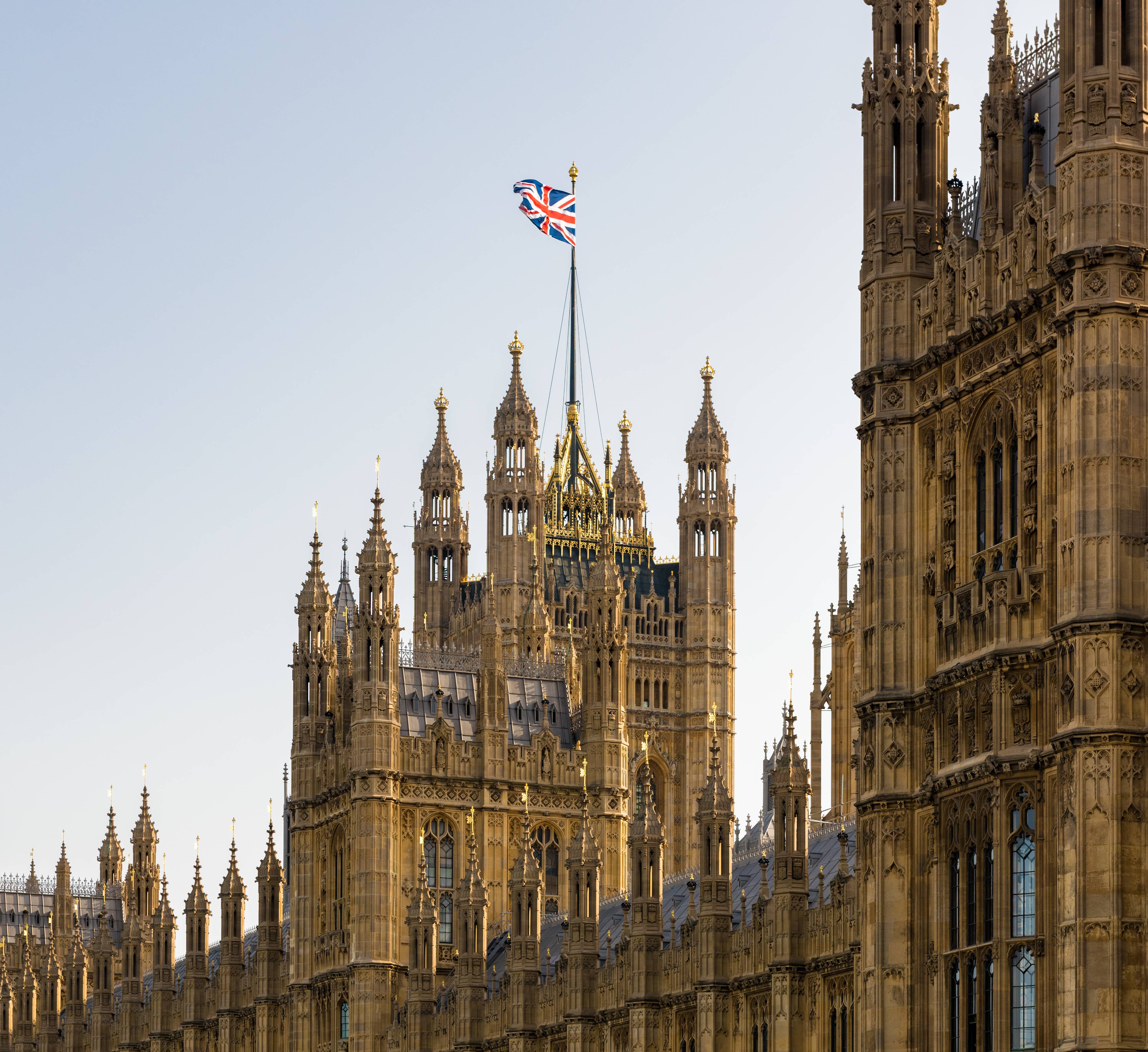 Westminster Houses of Parliament flying the Union Jack
