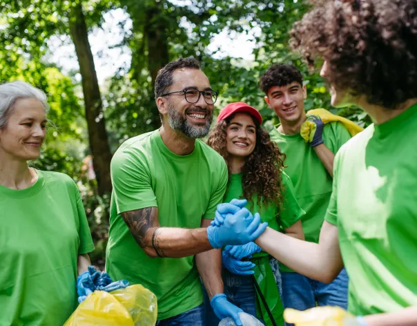 A group of charity trustees carrying out conservation work outside