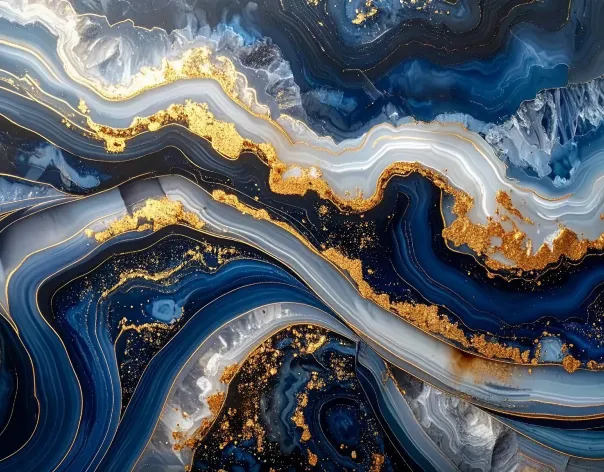 A view of a close-up of a swirl of blue marble and gold