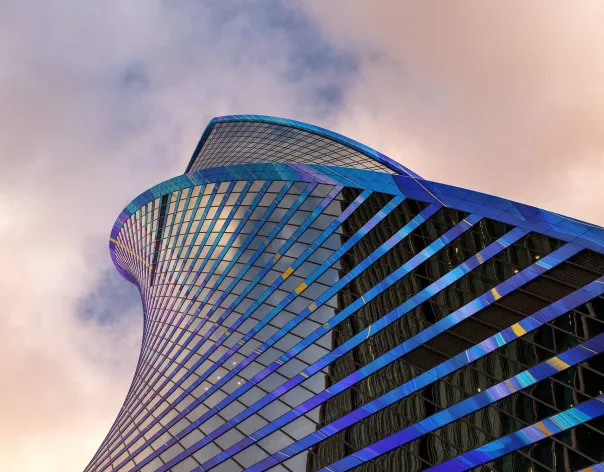 Looking upwards at the twisting Evolution Tower in Moscow