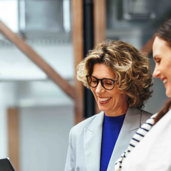 Woman laughing in an armchair