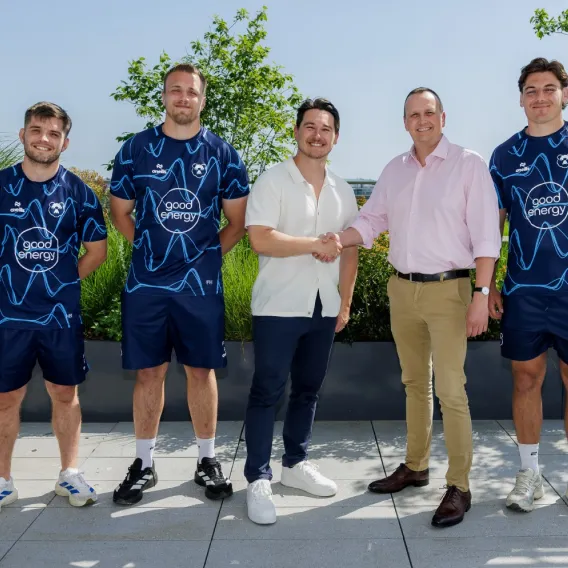 Rathbones' Scott Jones shakes hands with Bristol Bears players