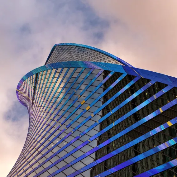 Looking upwards at the twisting Evolution Tower in Moscow