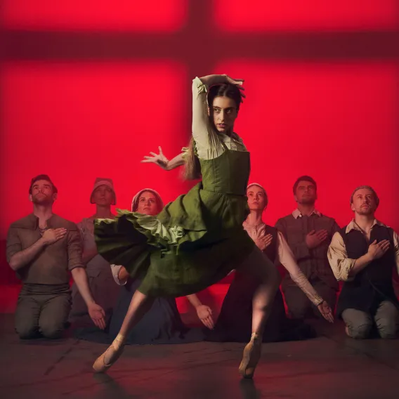 A lead dancer dances during Scottish Ballet's performance of "The Crucible"