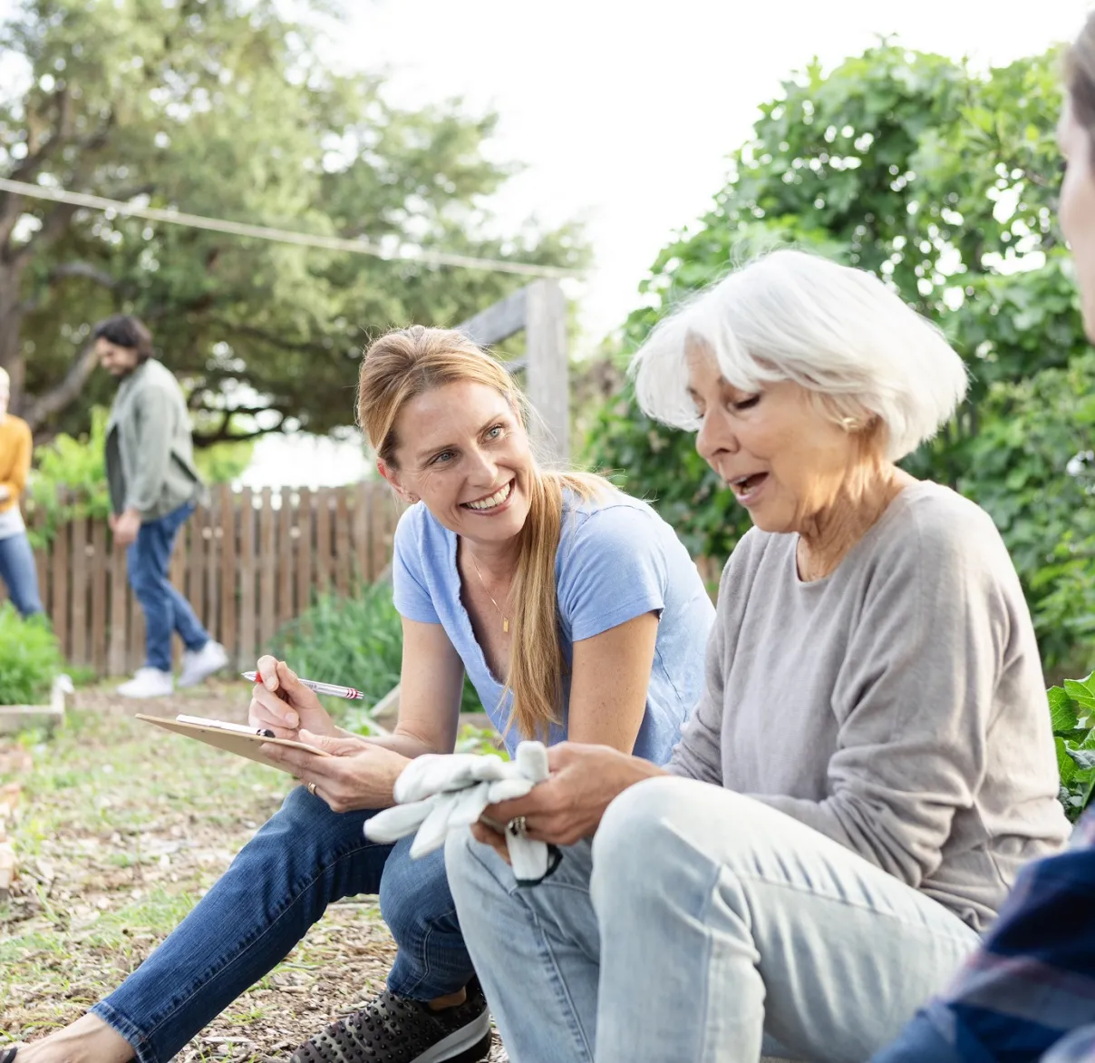 Charity workers volunteering in a community garden