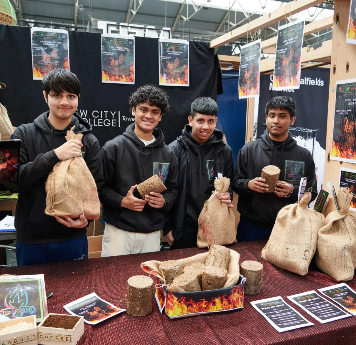 Students of Young Enterprise selling products they've made at a trade fair in London