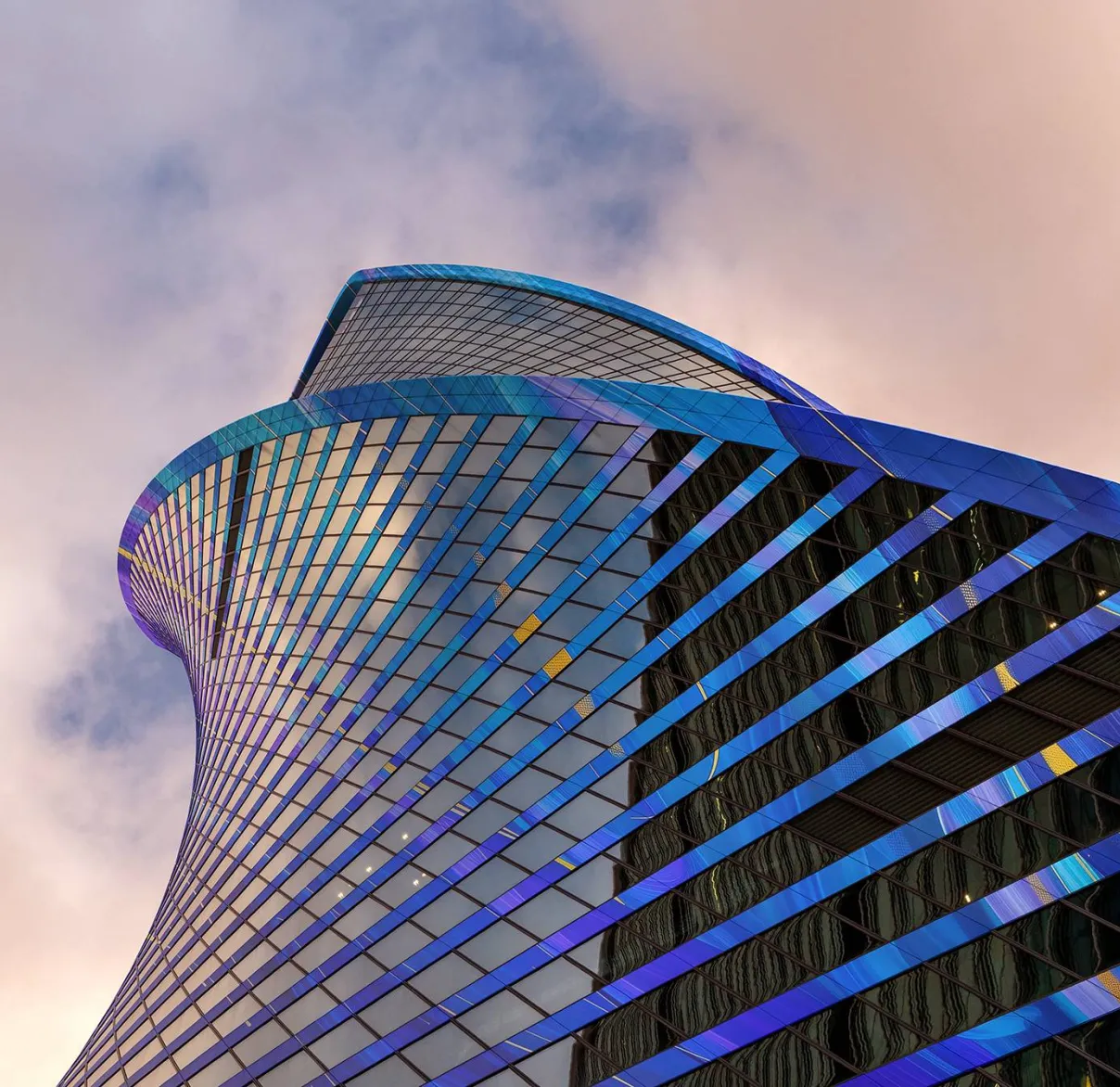 Looking upwards at the twisting Evolution Tower in Moscow