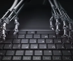 Robot hands on keyboard