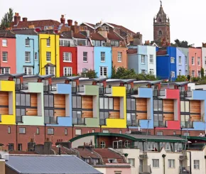 Rows of colourful apartments in a city