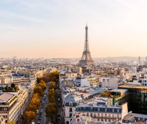 A view of the skyline of Paris, with the Eiffel Tower in the background