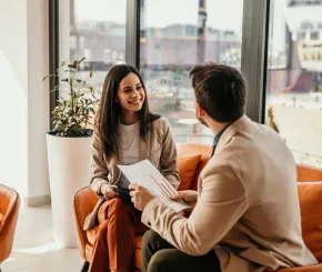 A client meets with their financial adviser