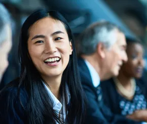 Young woman smiling at an event