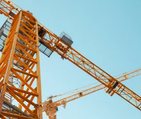 Looking up at a crane