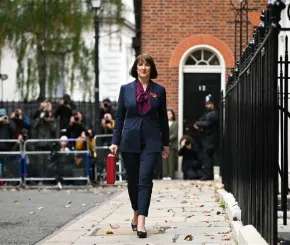 Rachel Reeves walks past 11 Downing Street with the red box in hand for the Autumn Statement