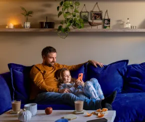 Father and daughter spending quality time in their living room