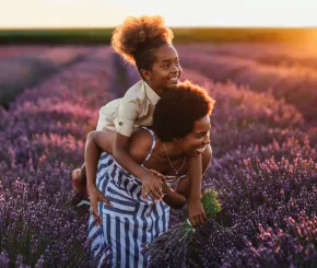 Mother and daughter in lavender field