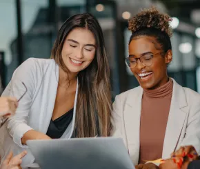 Two female colleagues in discussion
