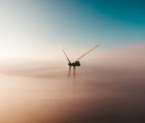 Image of wind turbine in the clouds