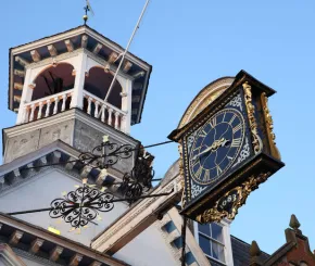 Clock tower with gold accents 