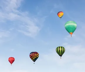 Slow rising hot air balloons