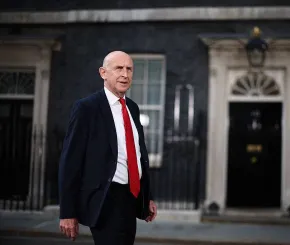 John Healey walks in front of Number 10 Downing Street