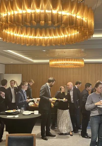 Attendees of our seminar on sustainability mill around and network