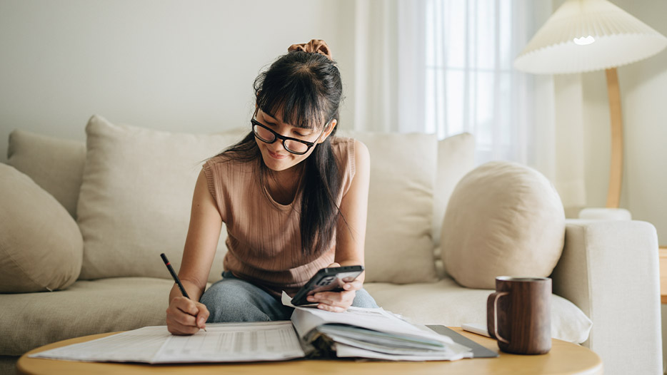 Lady on phone with couch