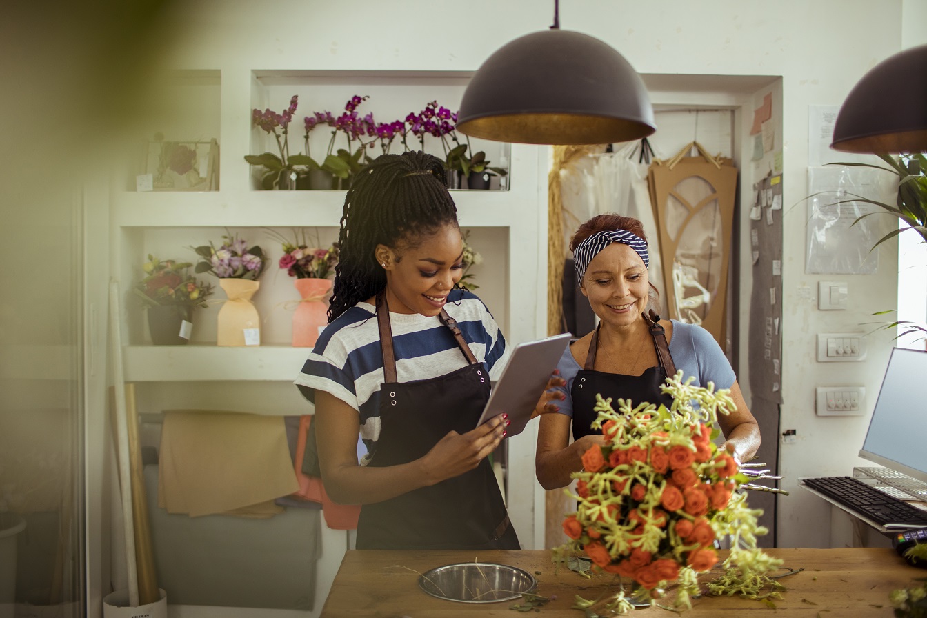 Mother and daughter having fun cooking together
