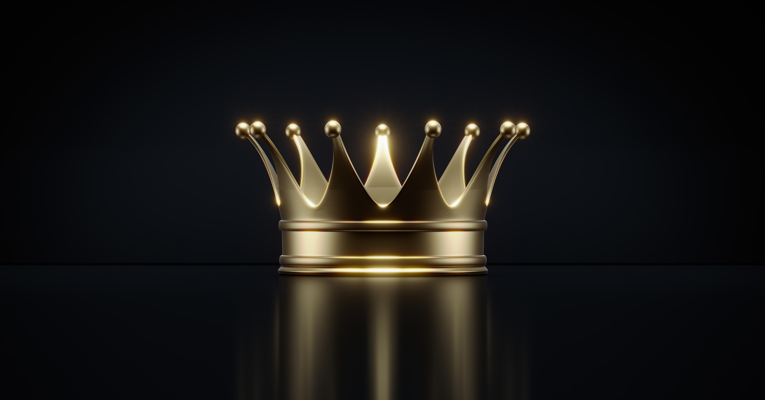 Red boxing gloves against pink background